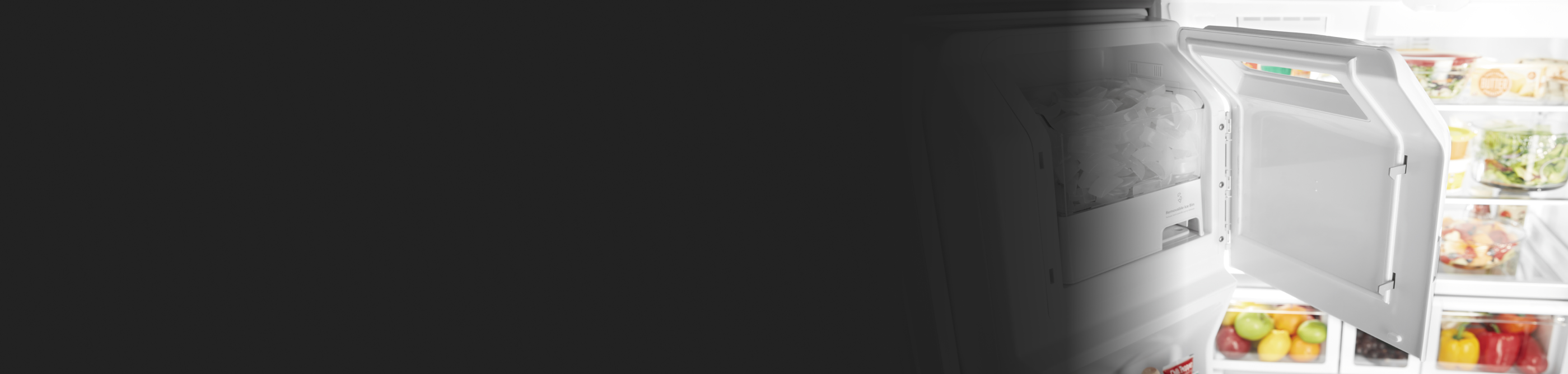 Freezer open to show icemaker