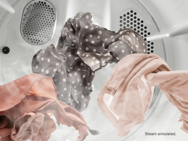 A light load of clothes tumbling with a simulated steam cycle A light load of clothes tumbling with a simulated steam cycle