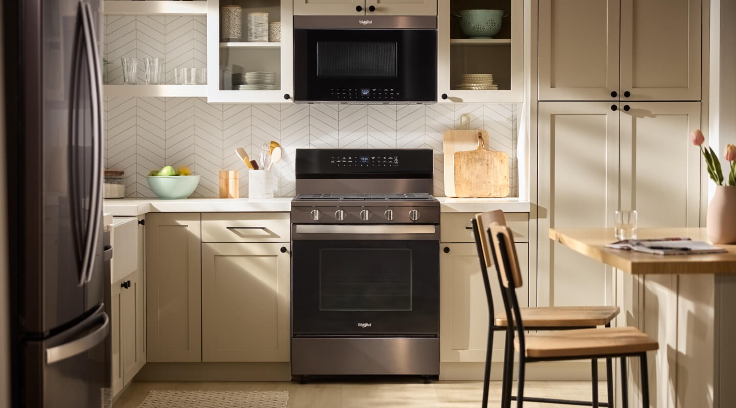 Whirlpool® range in beige cabinetry