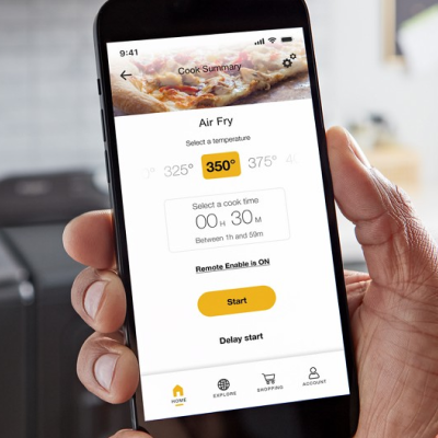 Closeup of a person using a smartphone to monitor cooking times