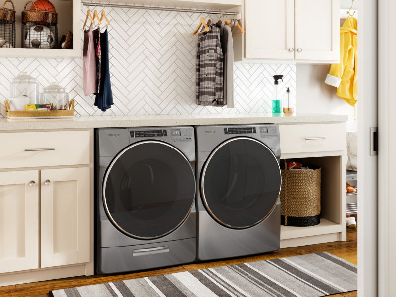 Stainless steel Whirlpool® washer and dryer set in laundry room Stainless steel Whirlpool® washer and dryer set in laundry room