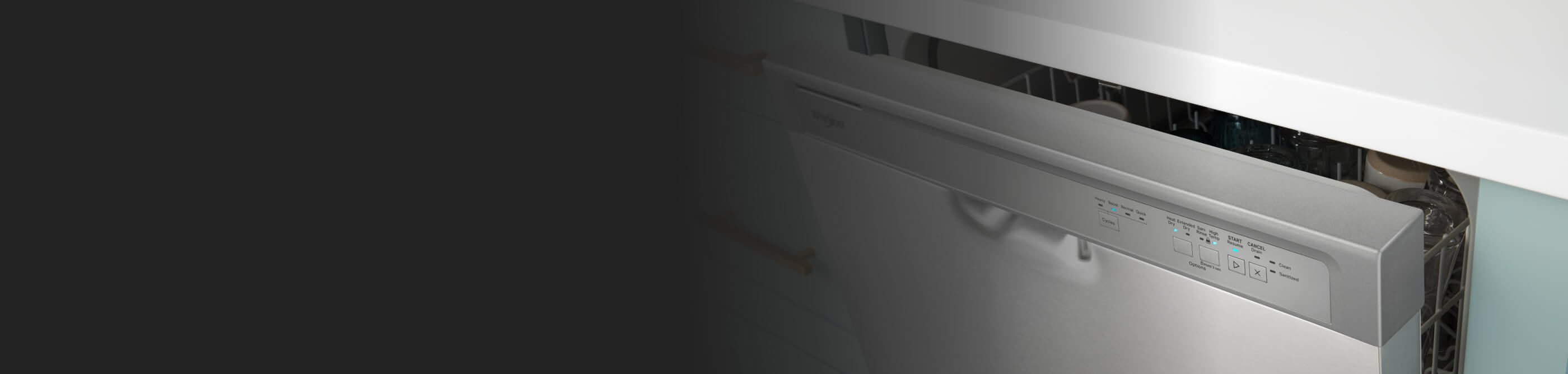 Whirlpool® Front Control Dishwasher with the door cracked open