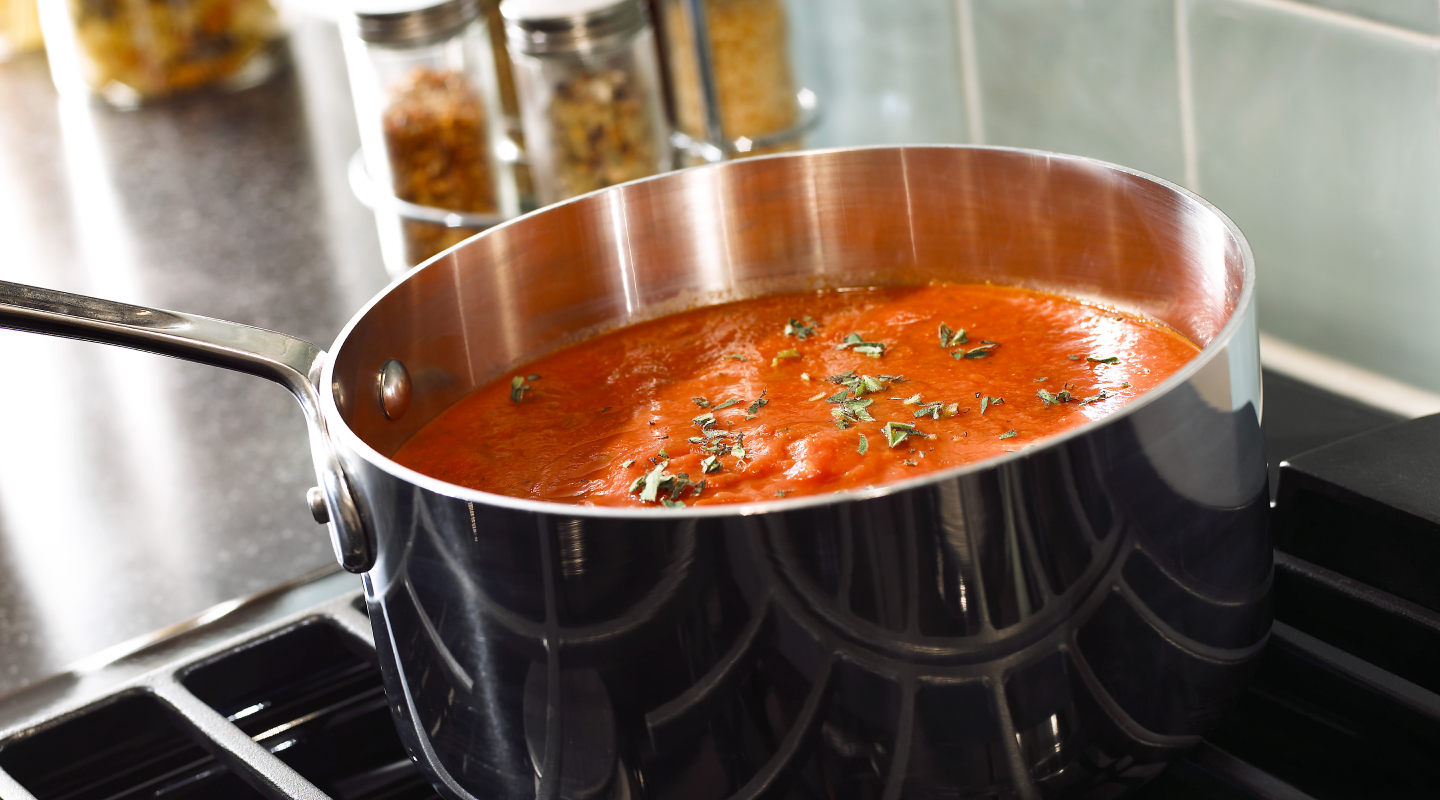 Stainless steel pan simmering on a Whirlpool® Gas Range Stainless steel pan simmering on a Whirlpool® Gas Range