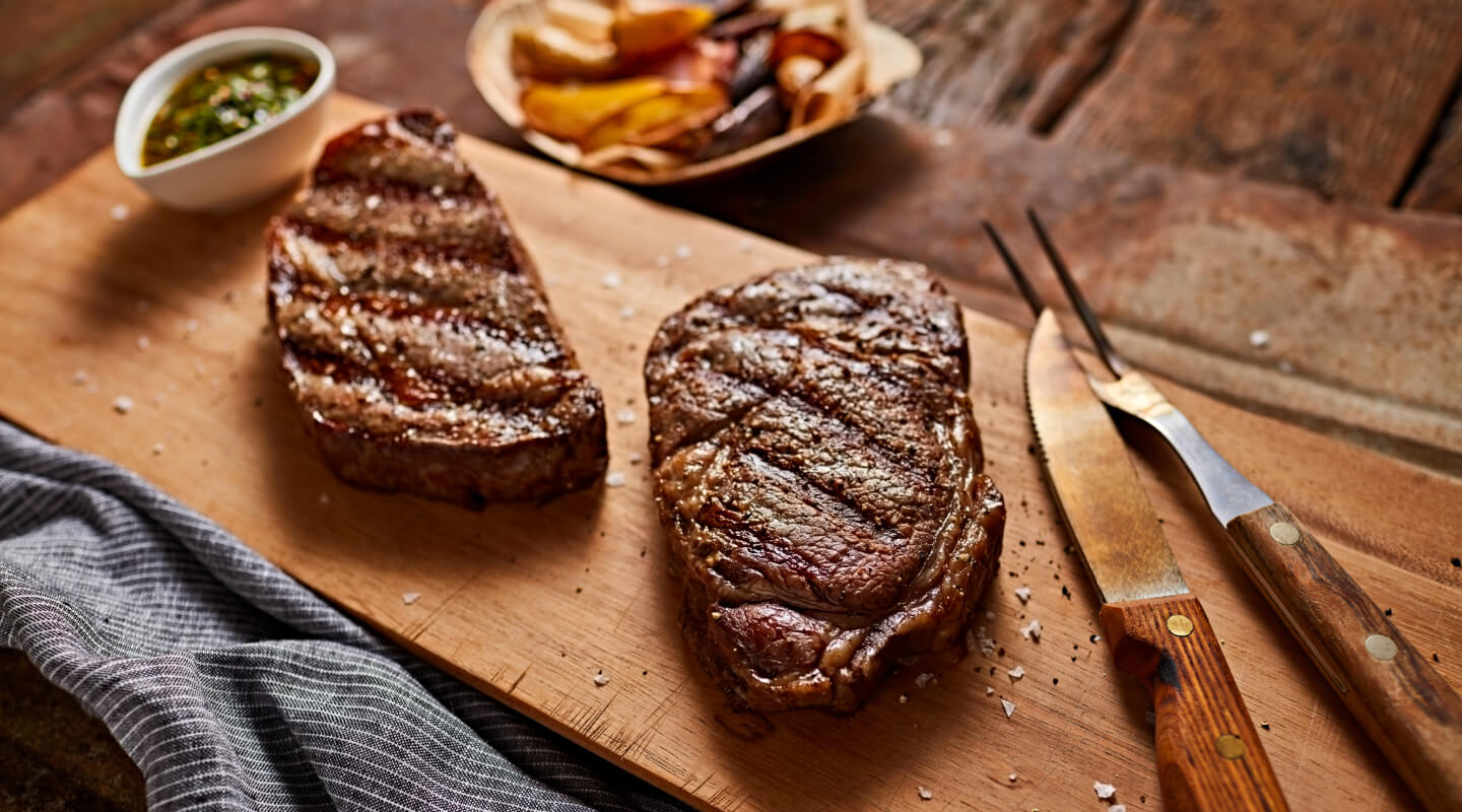 Grilled meat on a cutting board