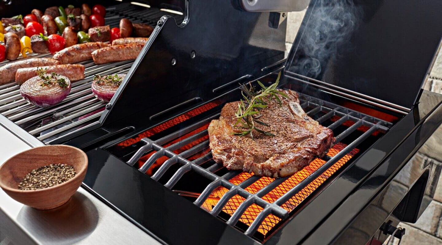 Steak with herbs on a grill