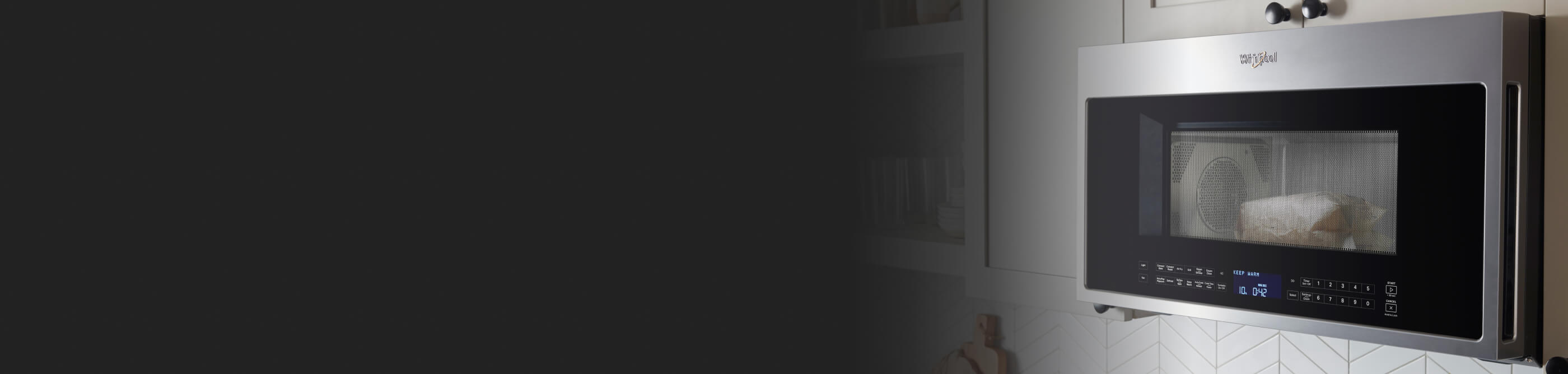 Whirlpool® Over-the-Range Microwave in a bright kitchen