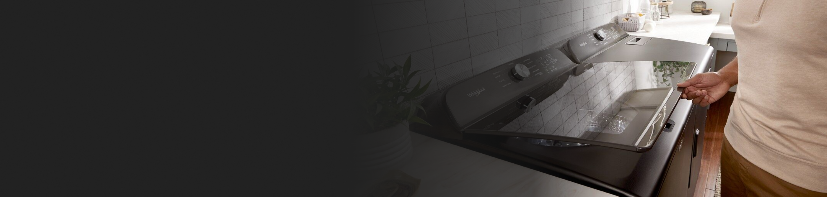 Person opening Whirlpool® Washer