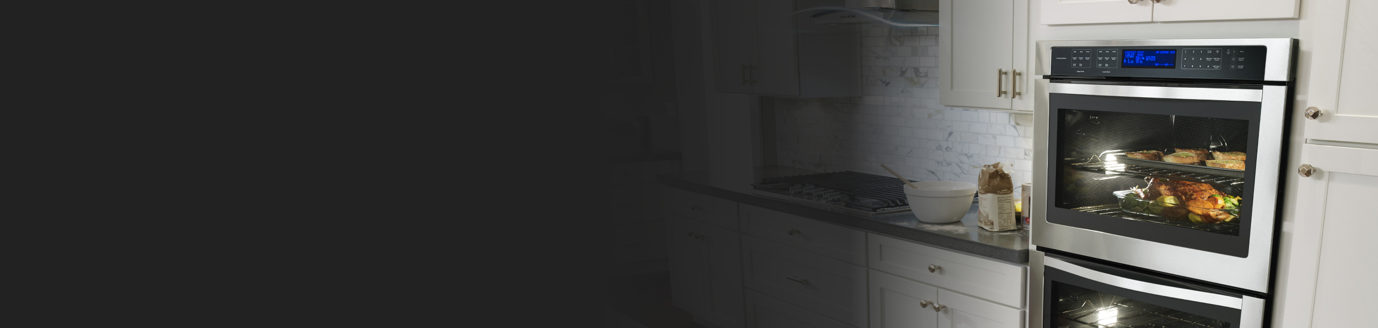 Whirlpool® double wall oven in a white modern kitchen