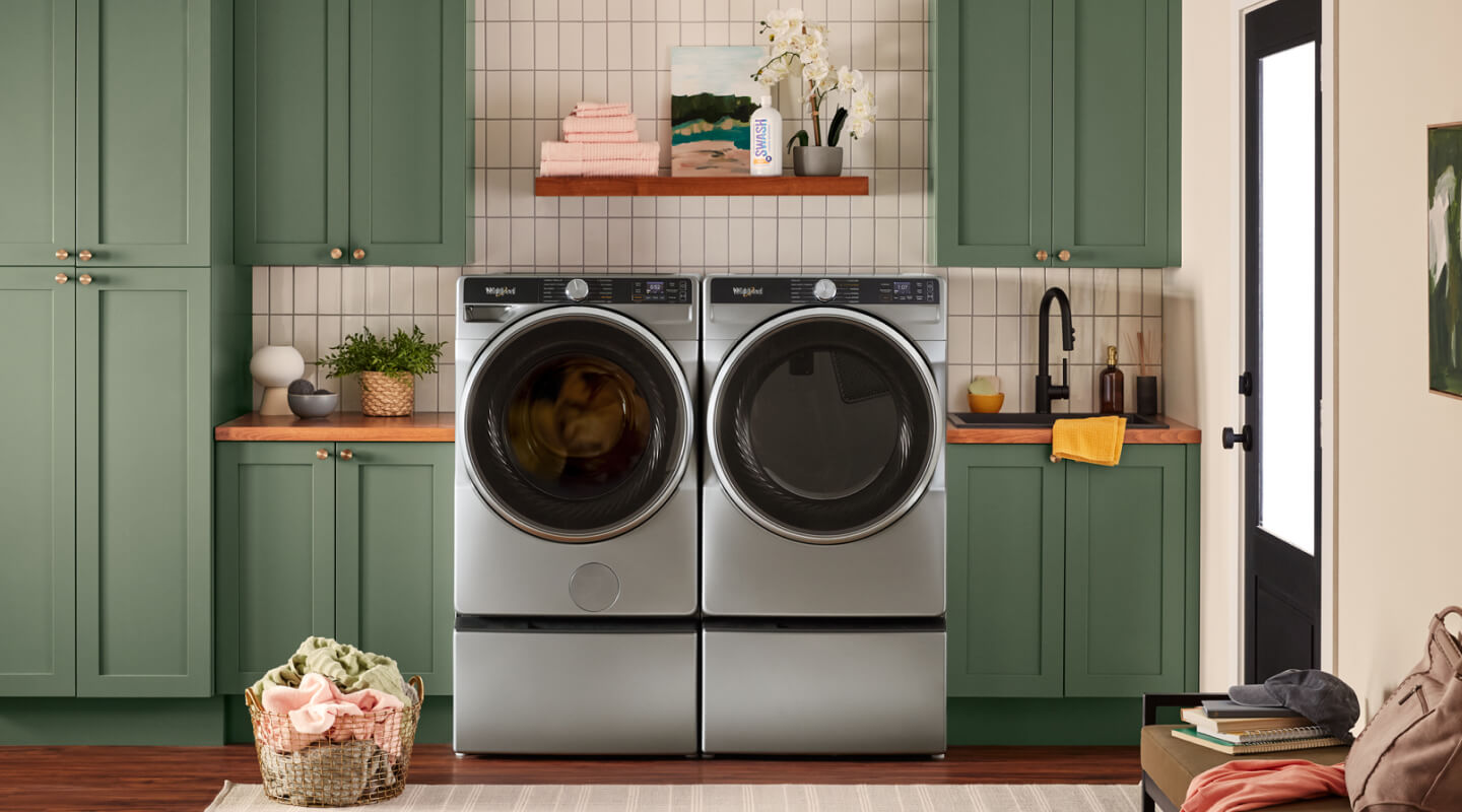 Whirlpool® Front Load Washer and Dryer in a laundry room