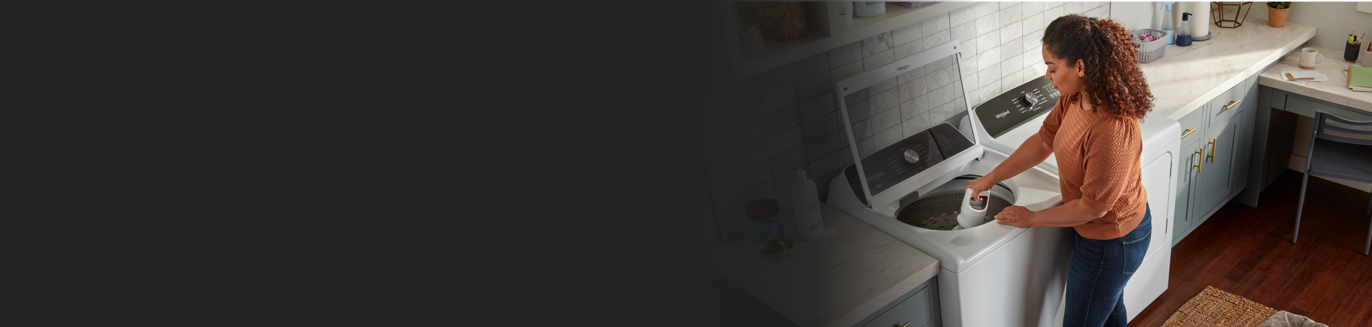  Person removing agitator from Whirlpool® 2-in-1 washing machine