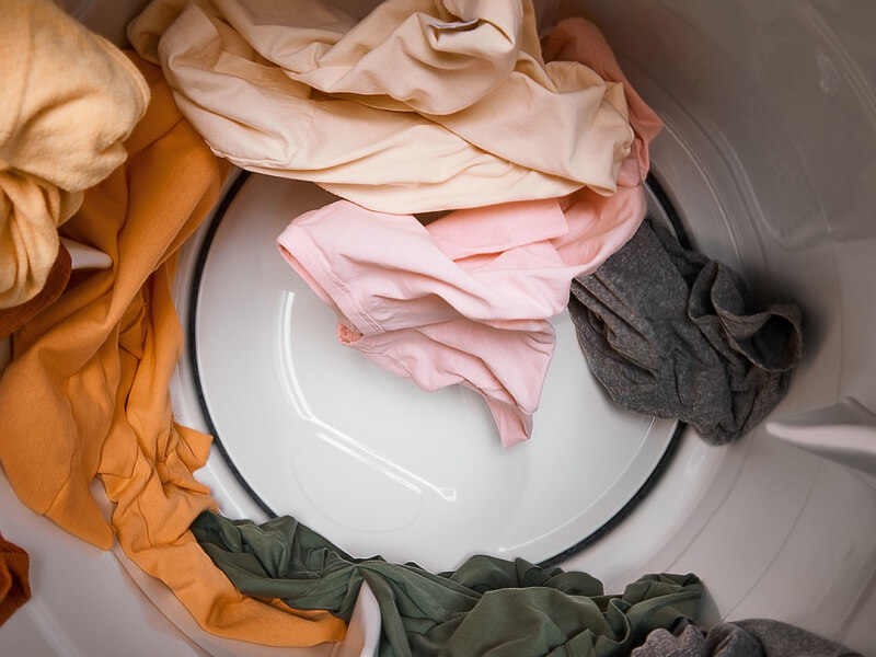Clothes in a dryer Clothes in a dryer