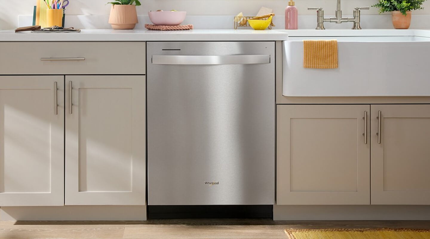 Stainless steel Whirlpool® Dishwasher in light color cabinetry