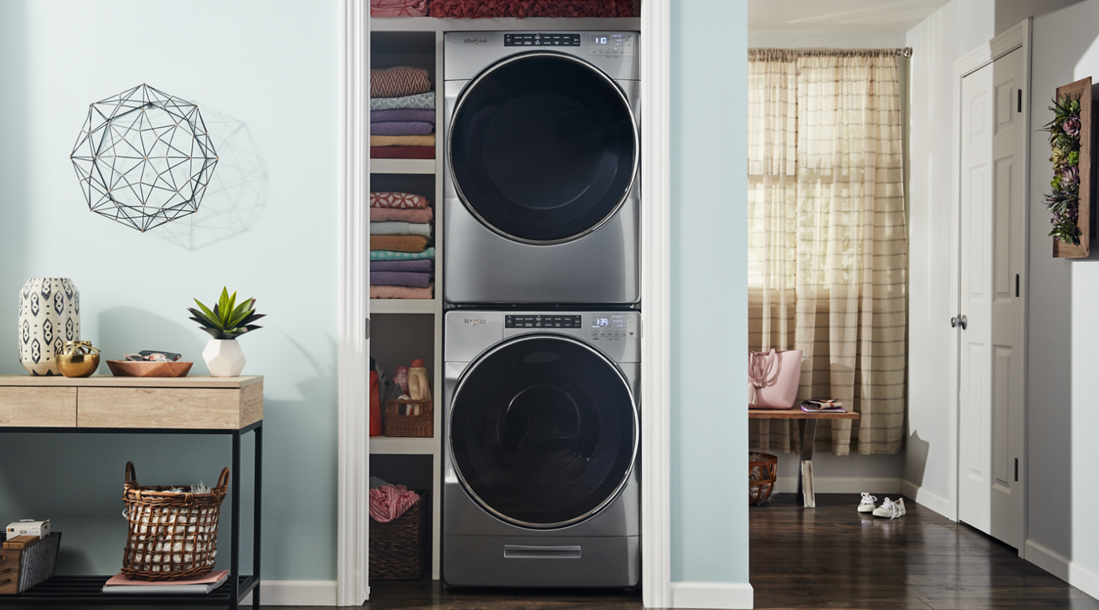 Stacked washer and dryer in a closet Stacked washer and dryer in a closet
