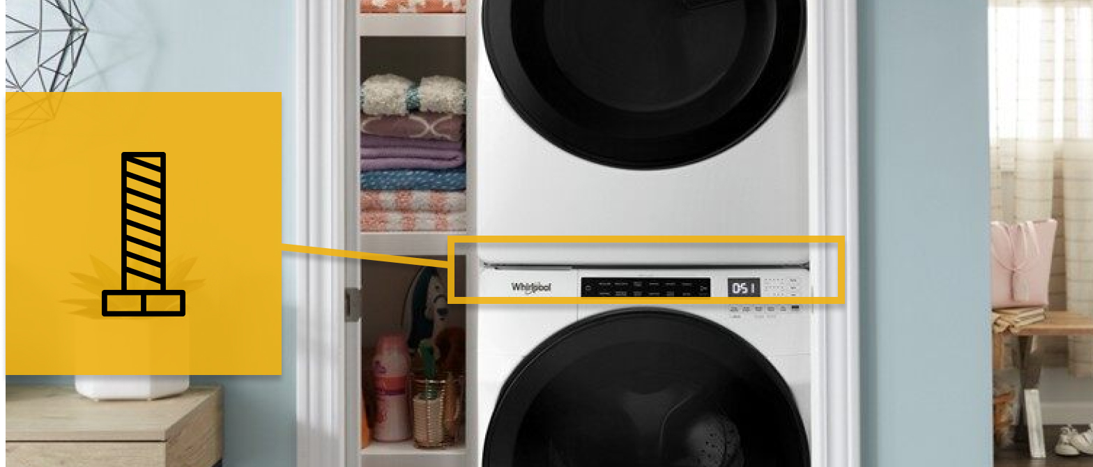 Close up of stacked white washer and dryer with a screw icon Close up of stacked white washer and dryer with a screw icon