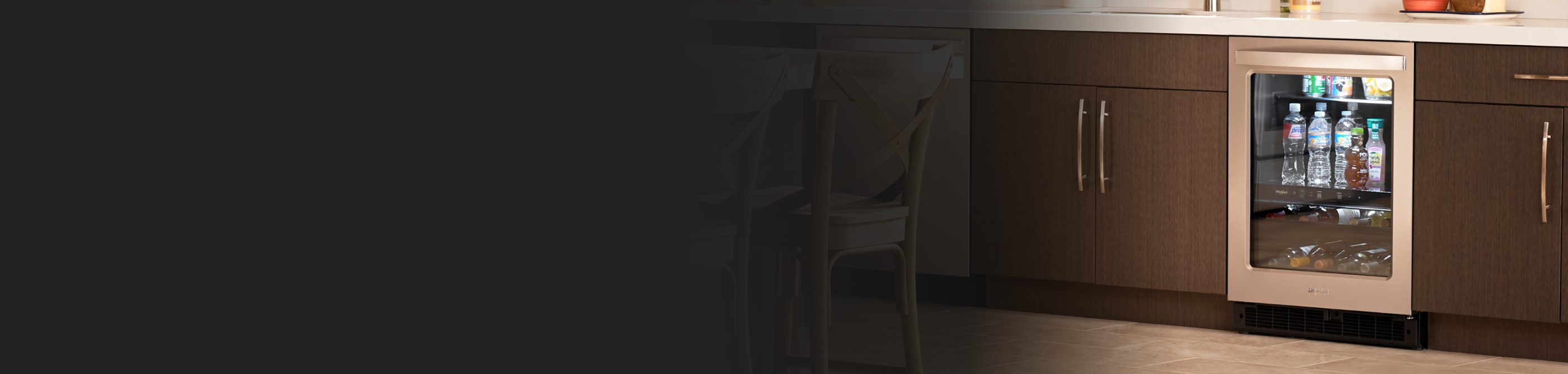 A Whirlpool® Undercounter Refrigerator with drinks inside