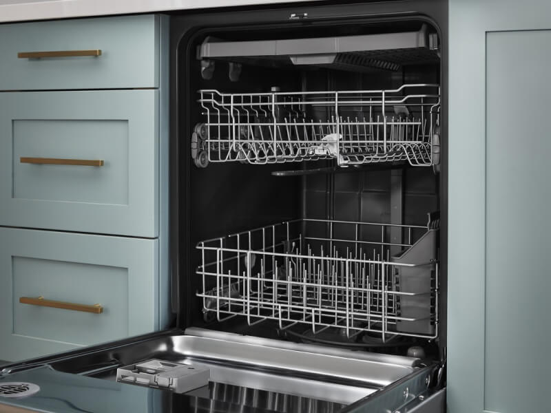 An empty, open dishwasher An empty, open dishwasher