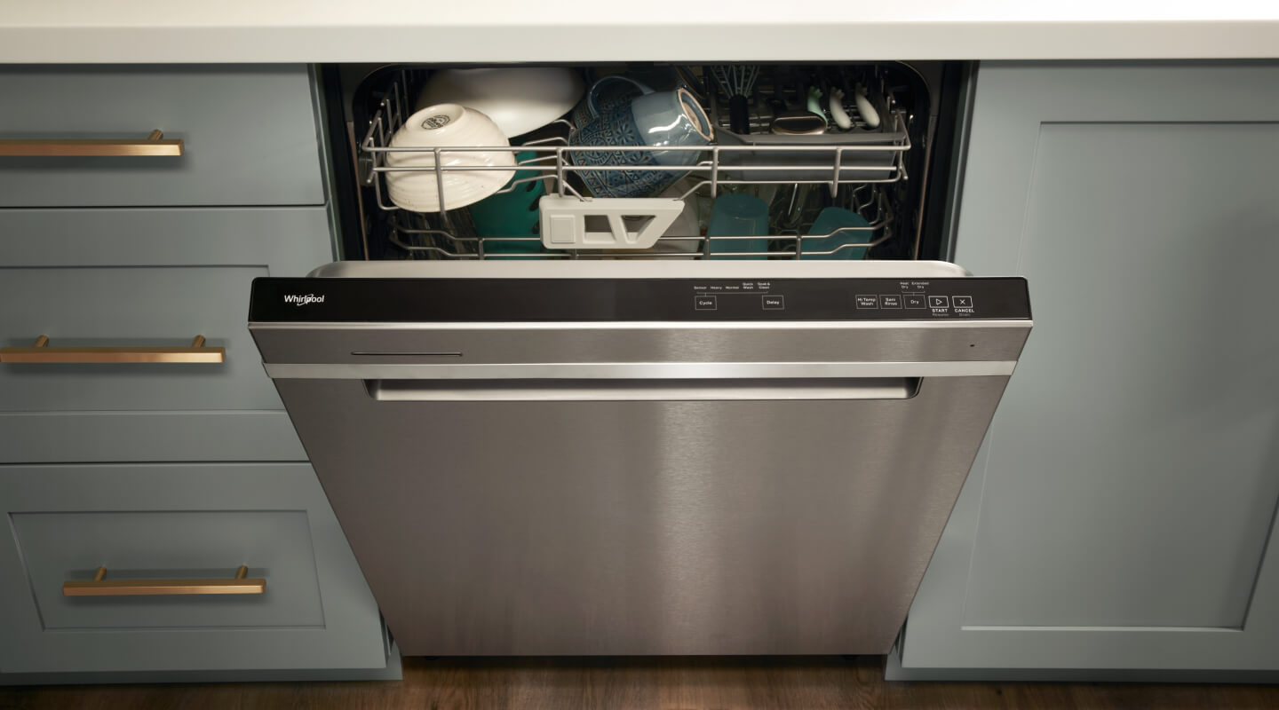 A partially opened Whirlpool® Dishwasher