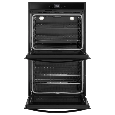 A double conventional oven with both doors opened