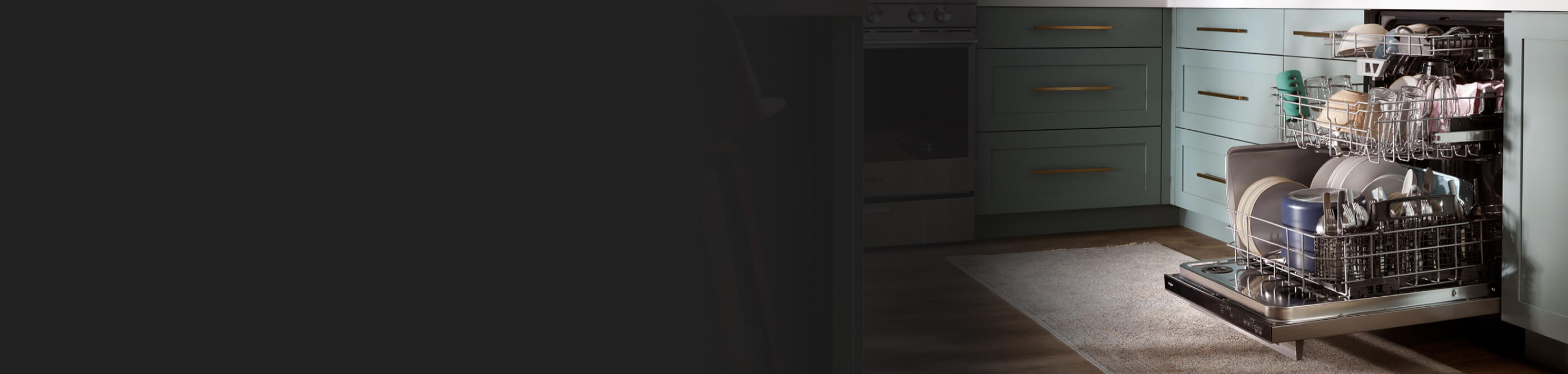 Open 3rd rack dishwasher with racks pulled out and full of dishes