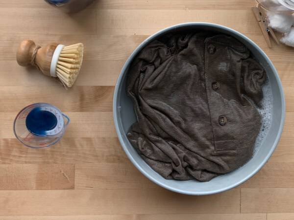 Shirt soaking in a basin