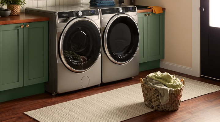 Whirlpool® Front Load Washer and Dryer pair in green cabinetry
