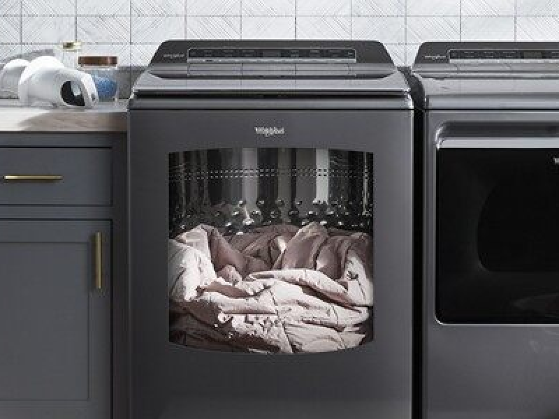 A Whirlpool® washer loaded with a down comforter