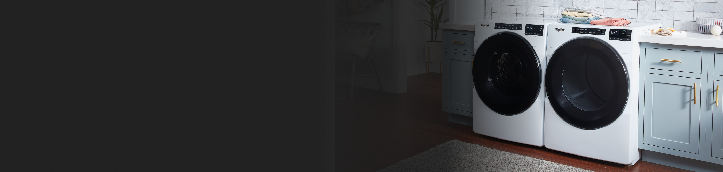 A white Whirlpool® front load washer and dryer.