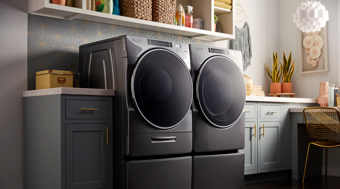 A front-load washer and dryer set by Whirlpool brand A front-load washer and dryer set by Whirlpool brand