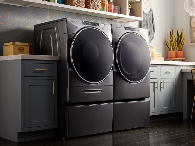 A front-load washer and dryer set by Whirlpool brand A front-load washer and dryer set by Whirlpool brand