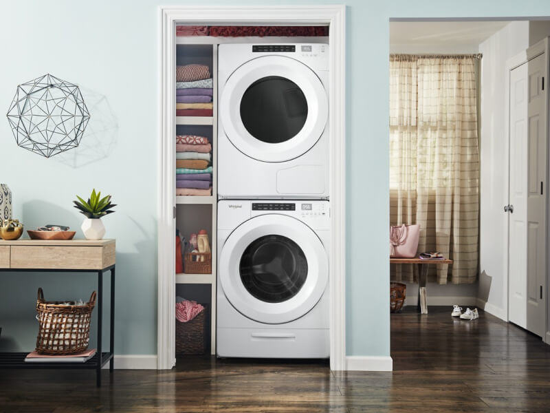 Stackable washer and dryer in a closet Stackable washer and dryer in a closet