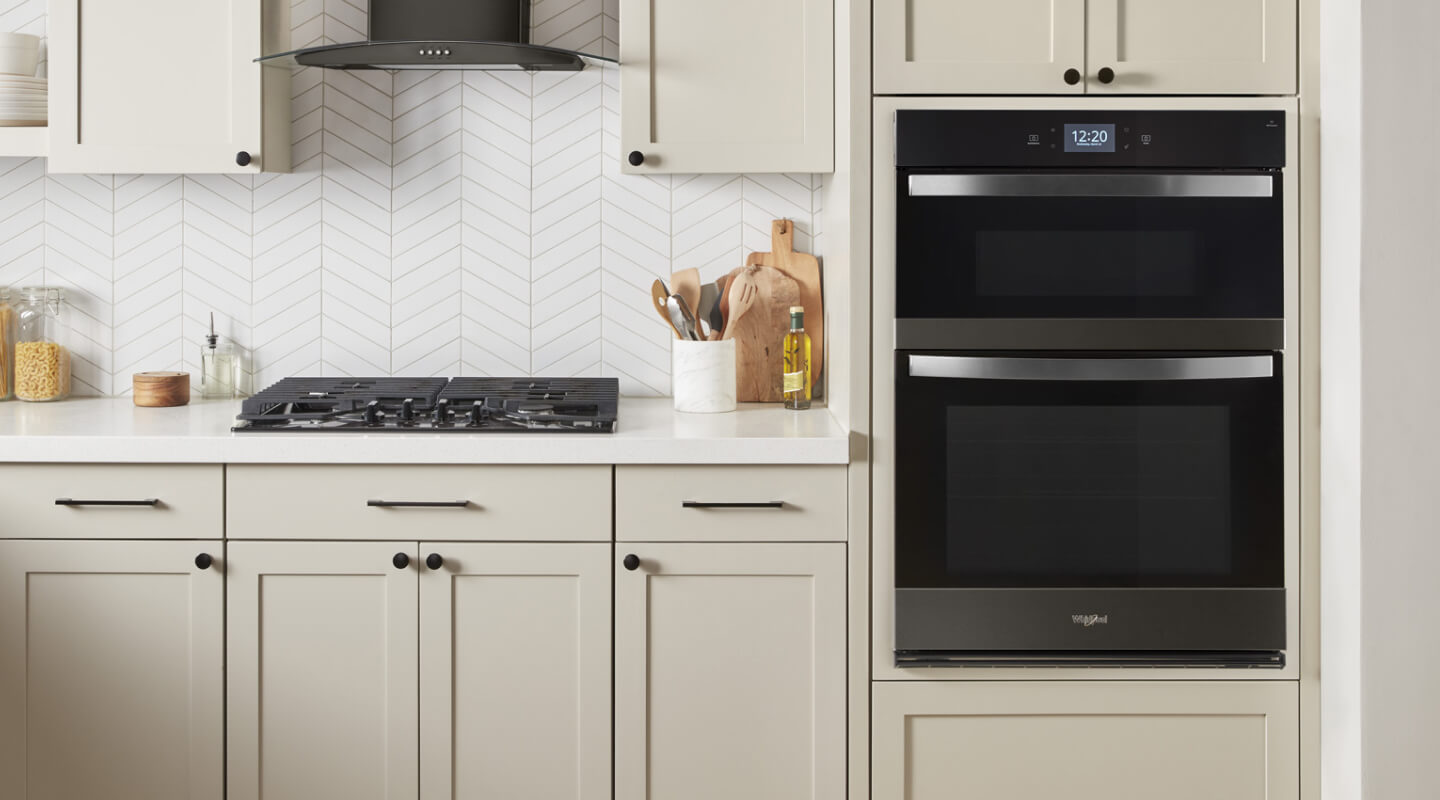 Whirlpool® Wall Oven Microwave Combo in cream cabinetry
