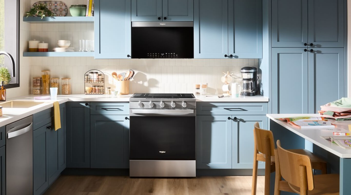 Whirlpool® Over-the-Range Microwave in blue cabinetry
