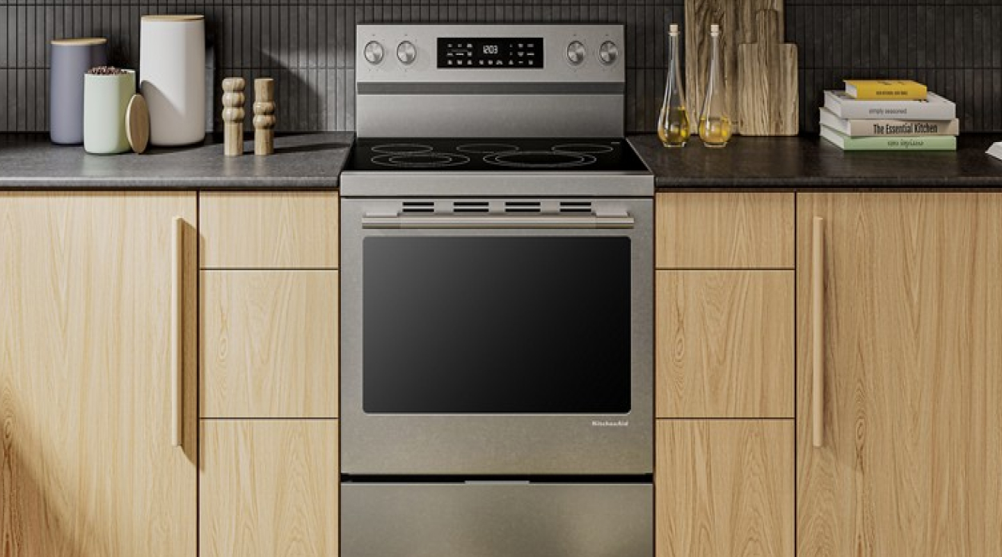 Front view of a range set in light cabinetry