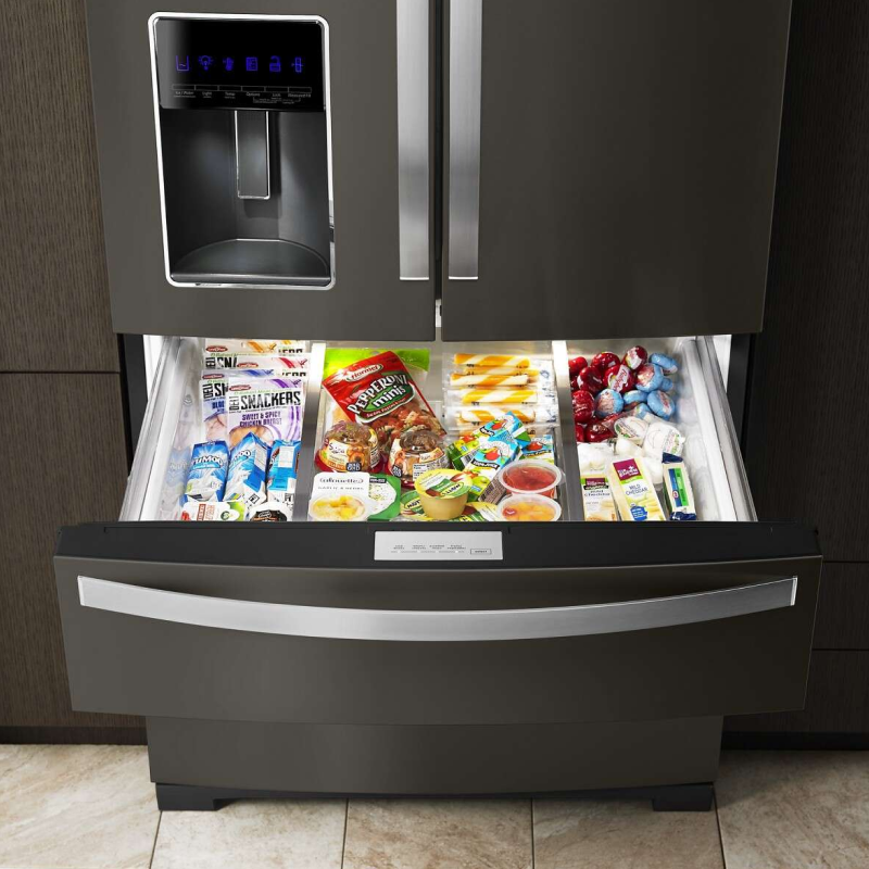Whirlpool® Refrigerator with exterior drawer pulled out and full of food