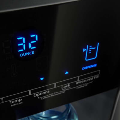 Close-up of a refrigerator water dispenser using the Measured Fill option