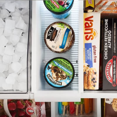 Bird’s-eye view of pint of ice cream stored in a pull-out freezer drawer