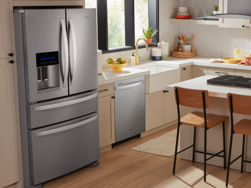 Stainless steel Whirlpool® Refrigerator with an exterior drawer in cream cabinetry