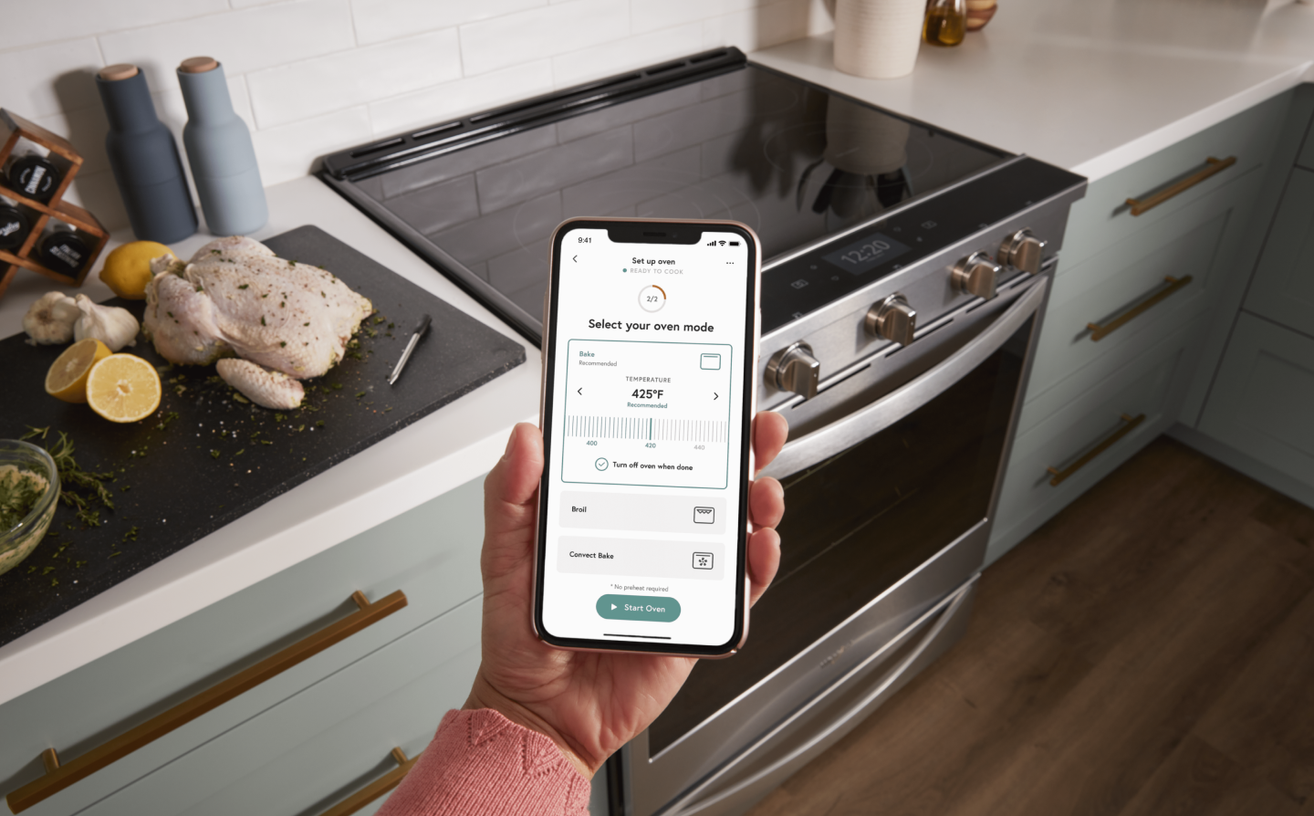 Hand setting oven temp on smartphone
