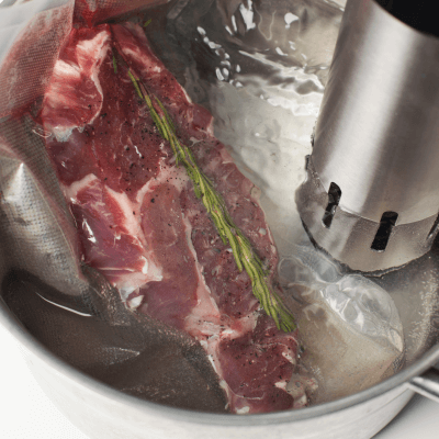 Meat in a baggie in a water bath