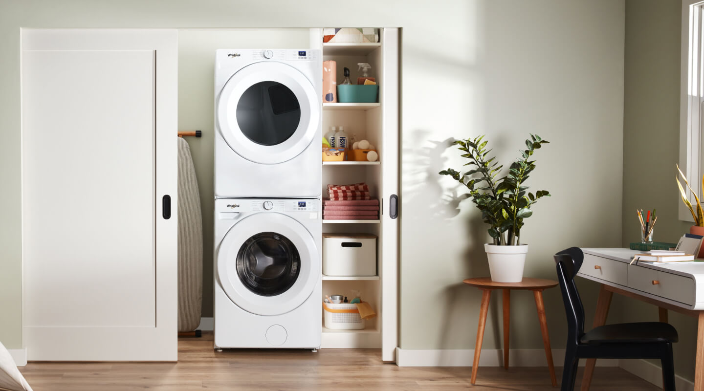 Stackable washer and dryer set in a laundry closet