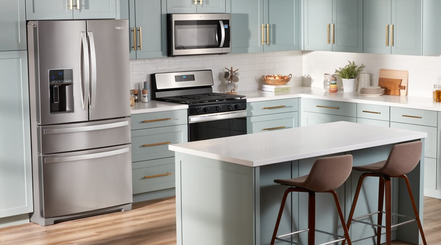 Whirlpool® Four Door Refrigerator in a modern kitchen