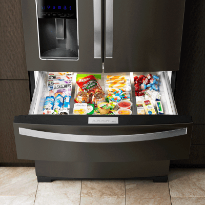 Bottom freezer open to show contents