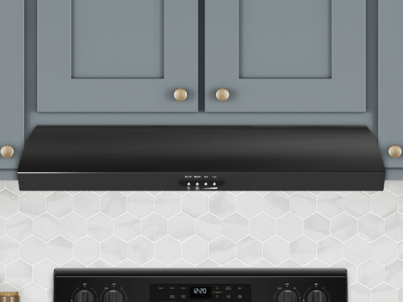 Black undercabinet hood under blue shaker cabinets Black undercabinet hood under blue shaker cabinets
