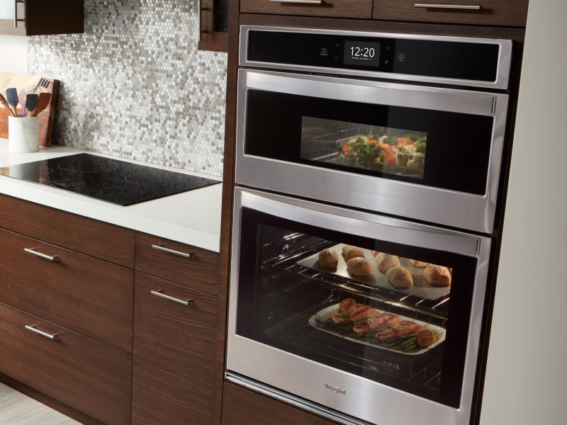 Various dishes cooking in a double wall oven Various dishes cooking in a double wall oven
