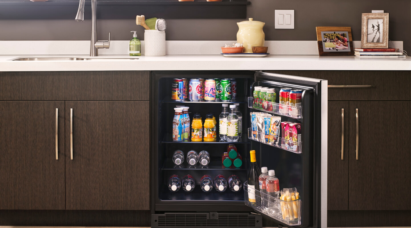 Whirlpool® beverage center filled with cans and bottles