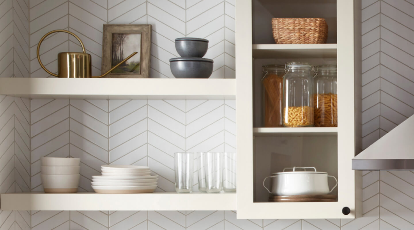 White shelves filled with dishes and glassware
