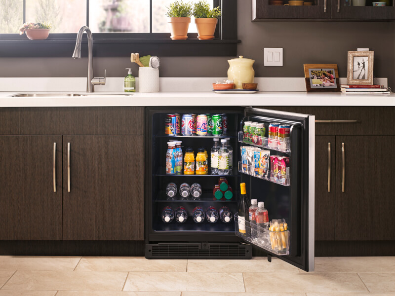 Whirlpool® beverage center filled with cans and bottles Whirlpool® beverage center filled with cans and bottles