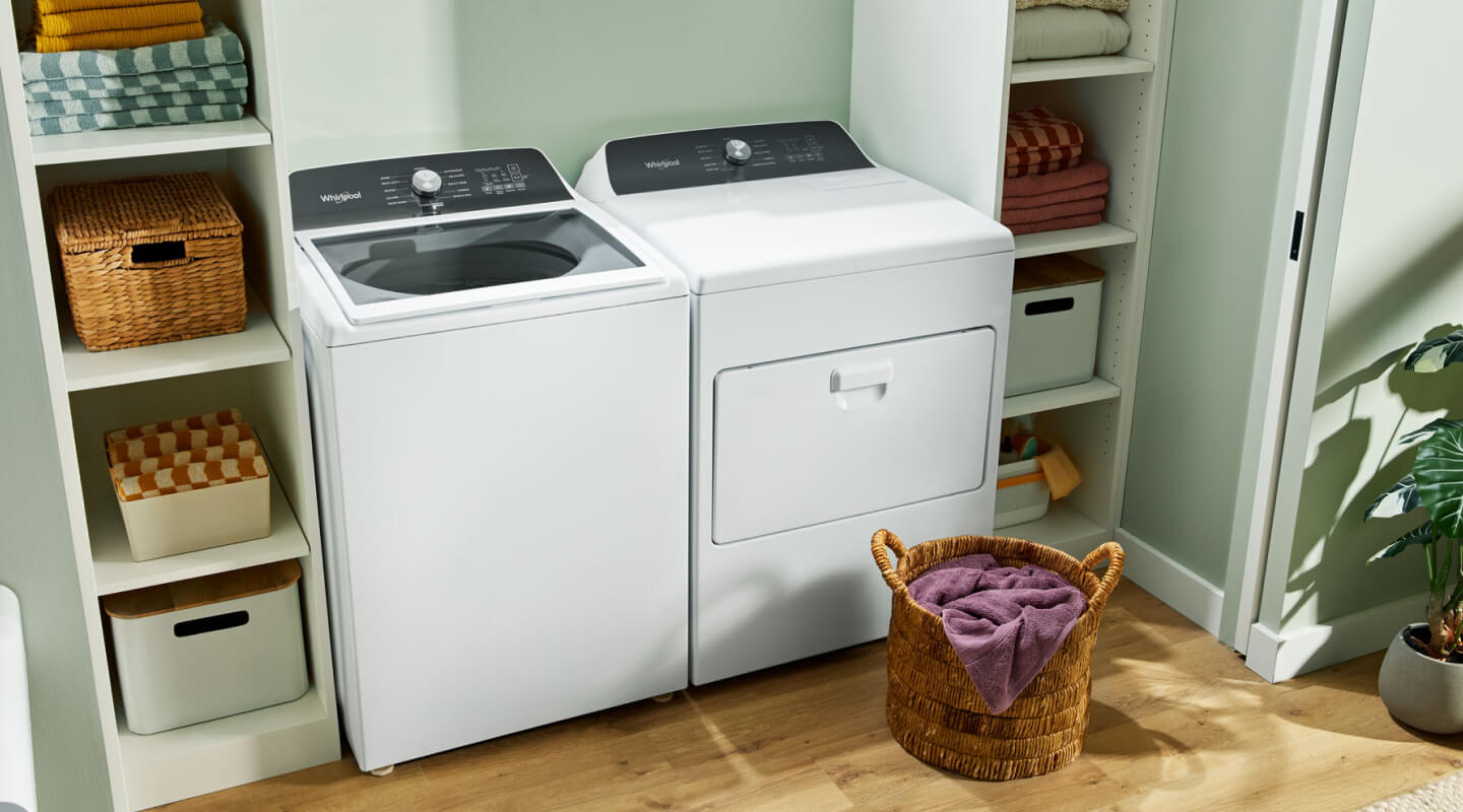 A white Whirlpool® Top-Load Washer and Dryer set A white Whirlpool® Top-Load Washer and Dryer set