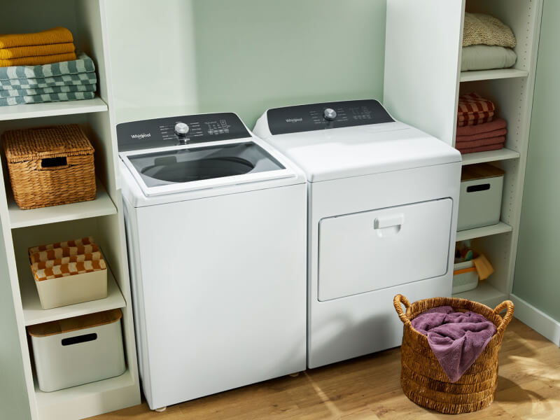 A white Whirlpool® Top-Load Washer and Dryer set A white Whirlpool® Top-Load Washer and Dryer set