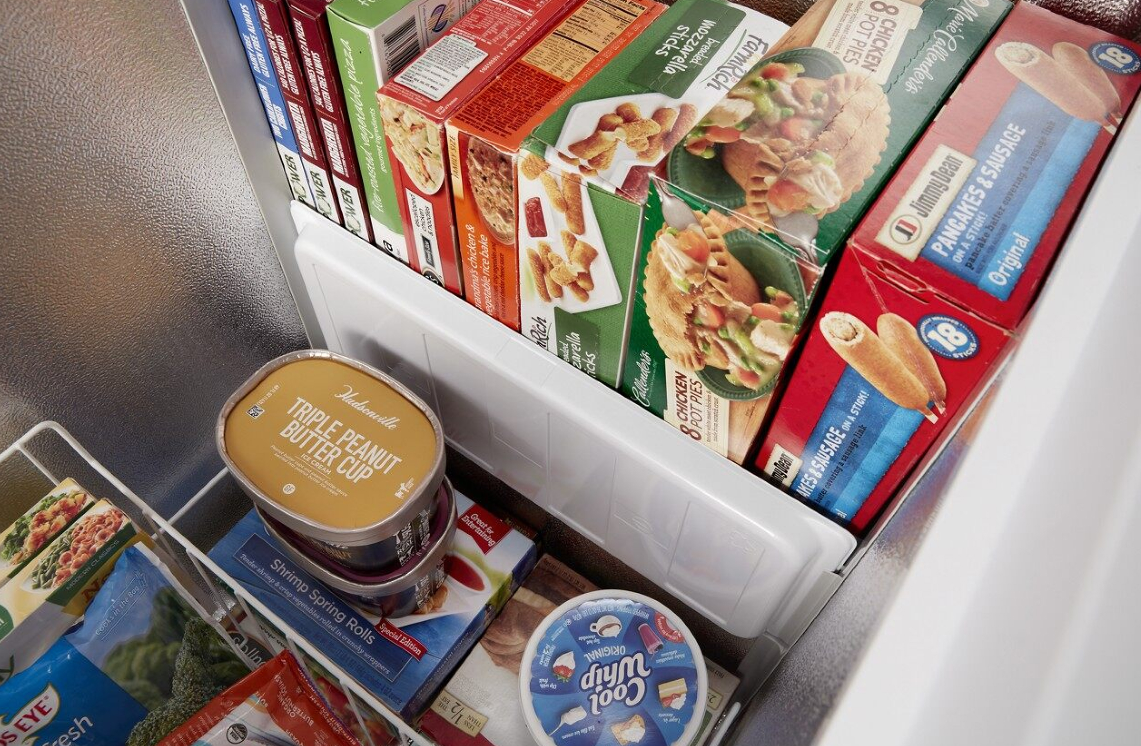 Close up view of food organized in a Whirlpool® deep freezer